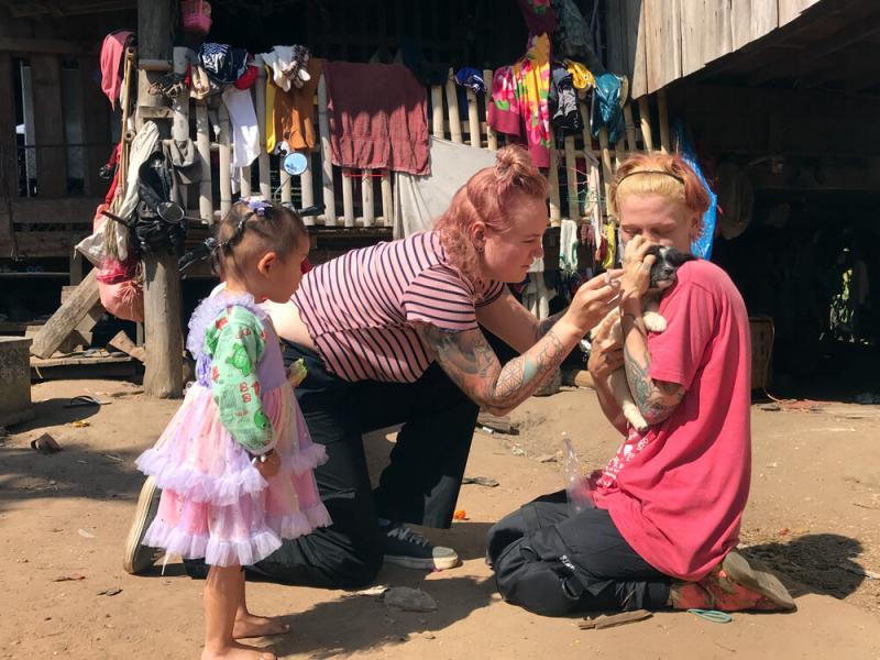Vaccinating a puppy in Thailand